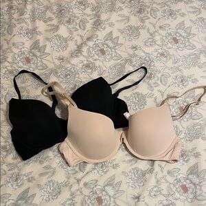 Victoria Secret’s Black and Cream Bras